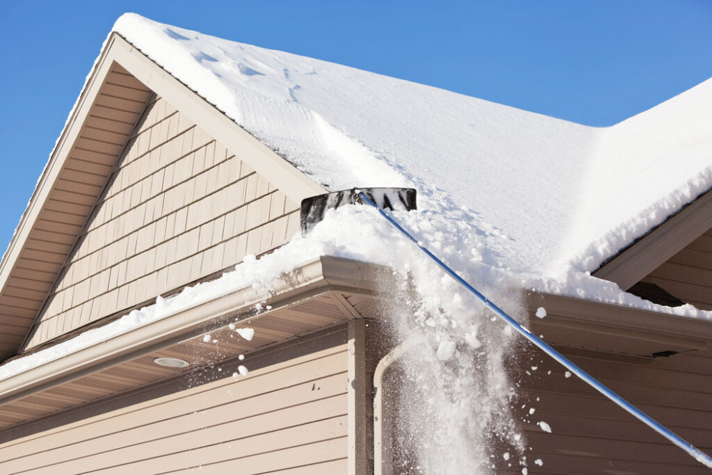 What are the risks of using a snow roof rake?
